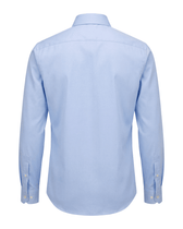 Light blue dress shirt on a white background