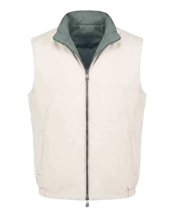 White puffer vest with green inner lining on a white background