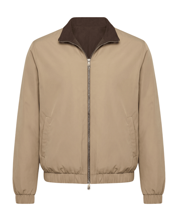 Beige jacket with brown collar on a black background
