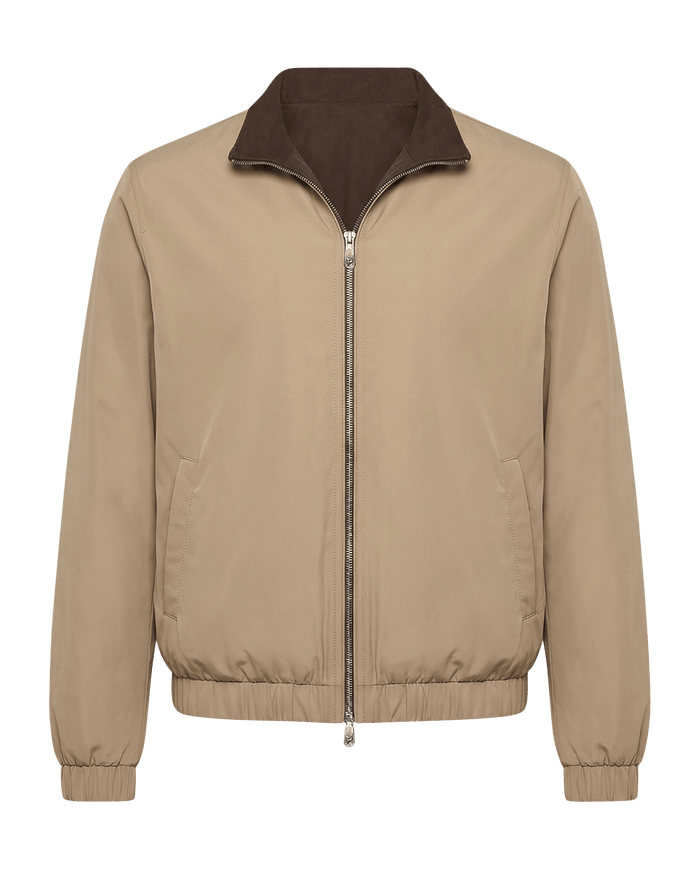 Beige jacket with brown collar on a black background