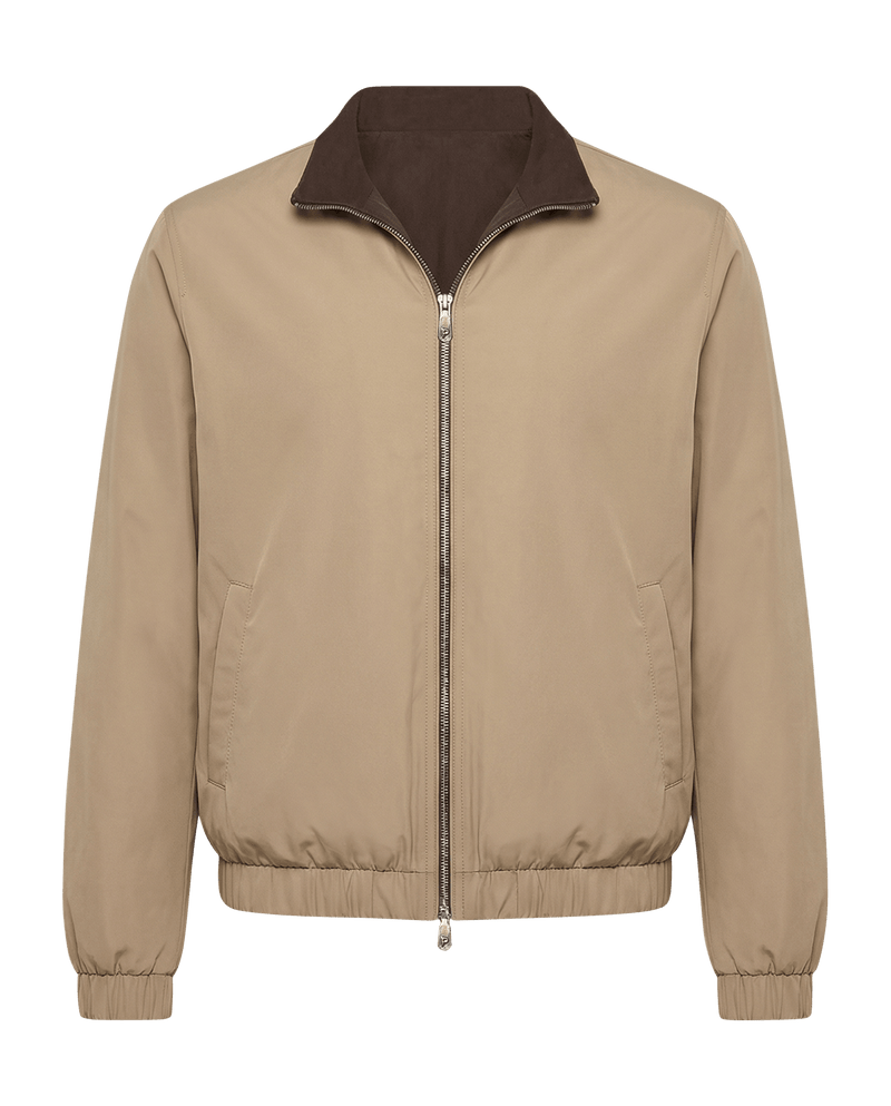 Beige jacket with brown collar on a black background