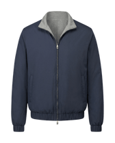 Navy blue jacket with gray collar on a black background