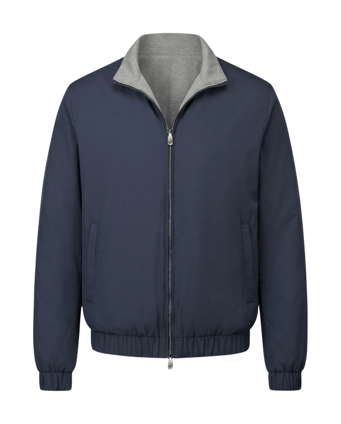 Navy blue jacket with gray collar on a black background
