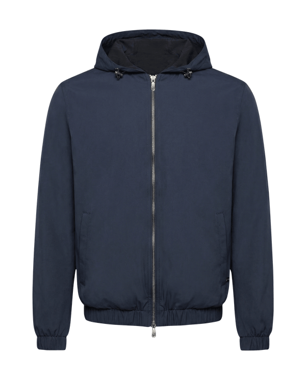 Navy blue jacket with a hood on a black background