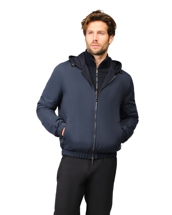 Man wearing a navy blue jacket on a white background