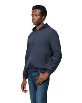 Man wearing a navy blue jacket on a white background