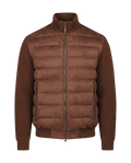 Brown puffer jacket on a black background