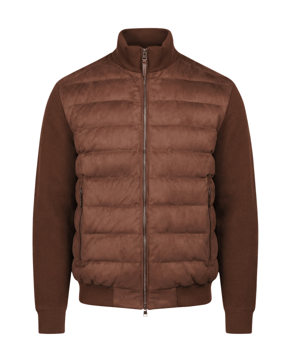 Brown puffer jacket on a black background