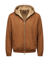 Brown jacket with beige hood on a black background
