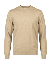 Beige sweater on a black background