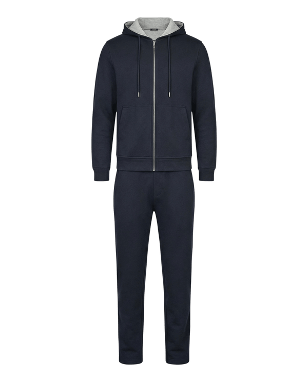 Navy tracksuit with a white hood on a black background