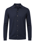 Navy blue button-up shirt on a black background