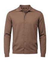 Brown button-up shirt on a black background