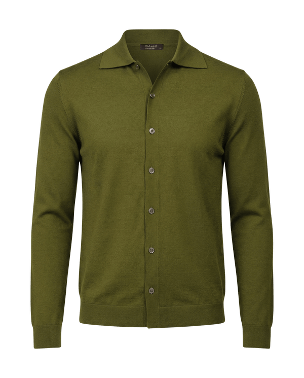 Green button-up shirt on a black background