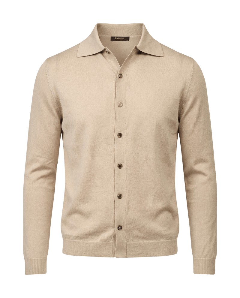 Beige cardigan with button details on a black background