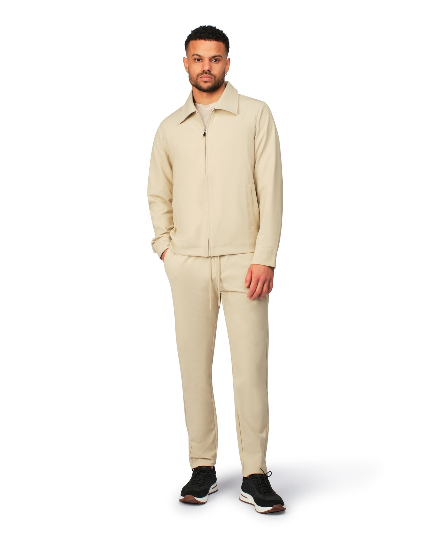 Beige tech jacket with modern design and front zipper, detailed product view.
