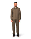 Man wearing a brown outfit on a white background