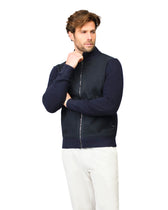 Man wearing a navy blue jacket on a white background