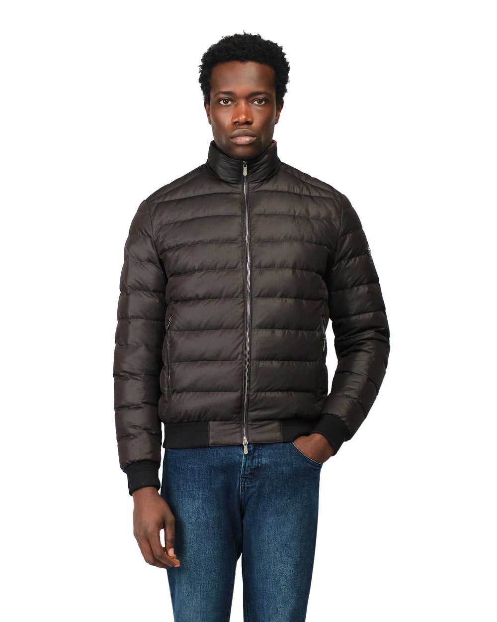 Man wearing a brown puffer jacket on a white background