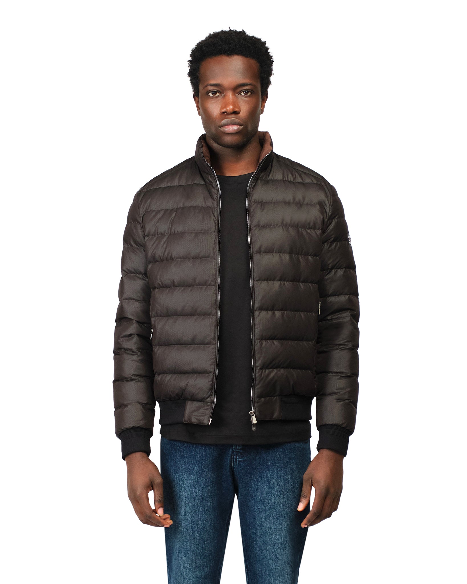 Man wearing a brown puffer jacket on a white background