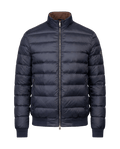 Blue puffer jacket on a black background